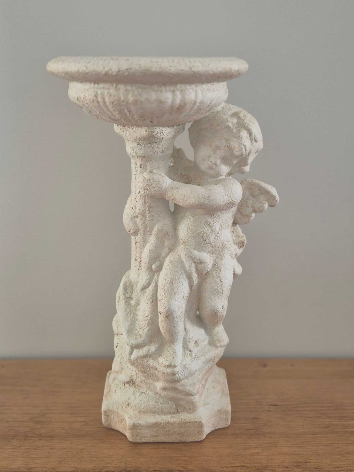 Cherub pedestal birdbath stone finish 3/4 angle