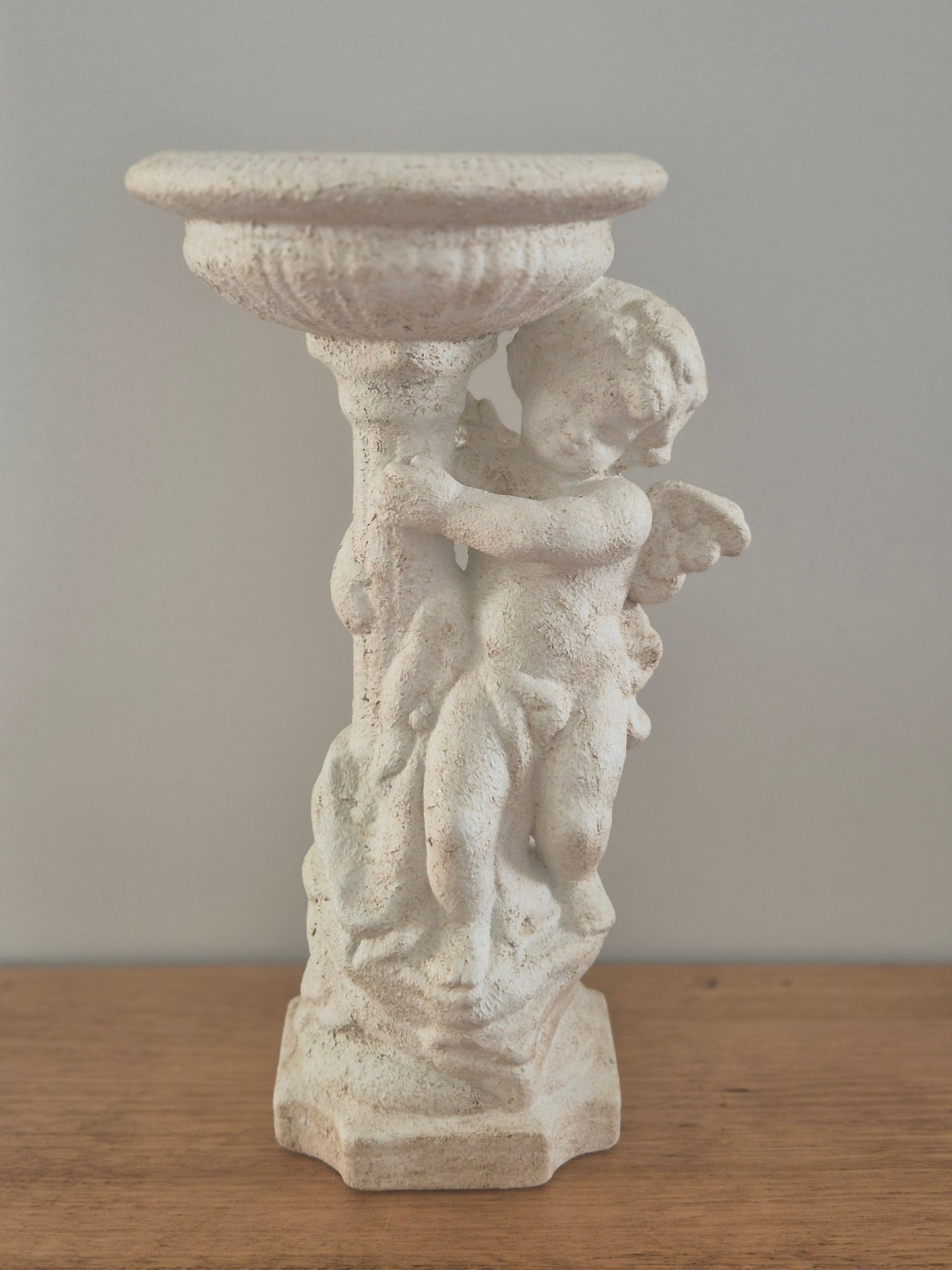 Cherub pedestal birdbath stone finish 3/4 angle